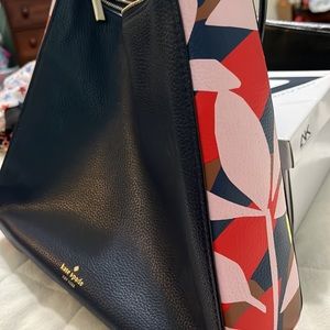 Kate Spade purse. Navy pebble, leather look with multi color sides. Shoulder